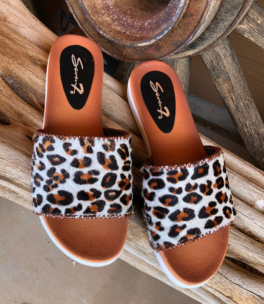 Women’s size 8 leopard print hair on hide slides
