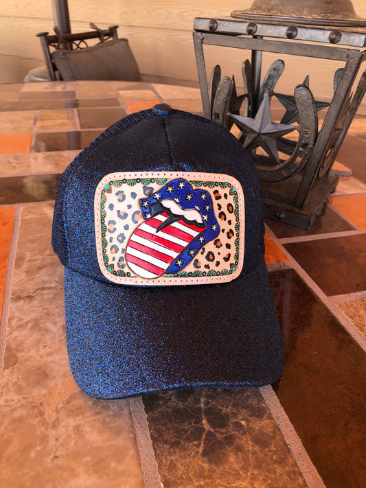 Women’s tooled leather patriotic rock n roll patch blue glitter ponytail trucker cap