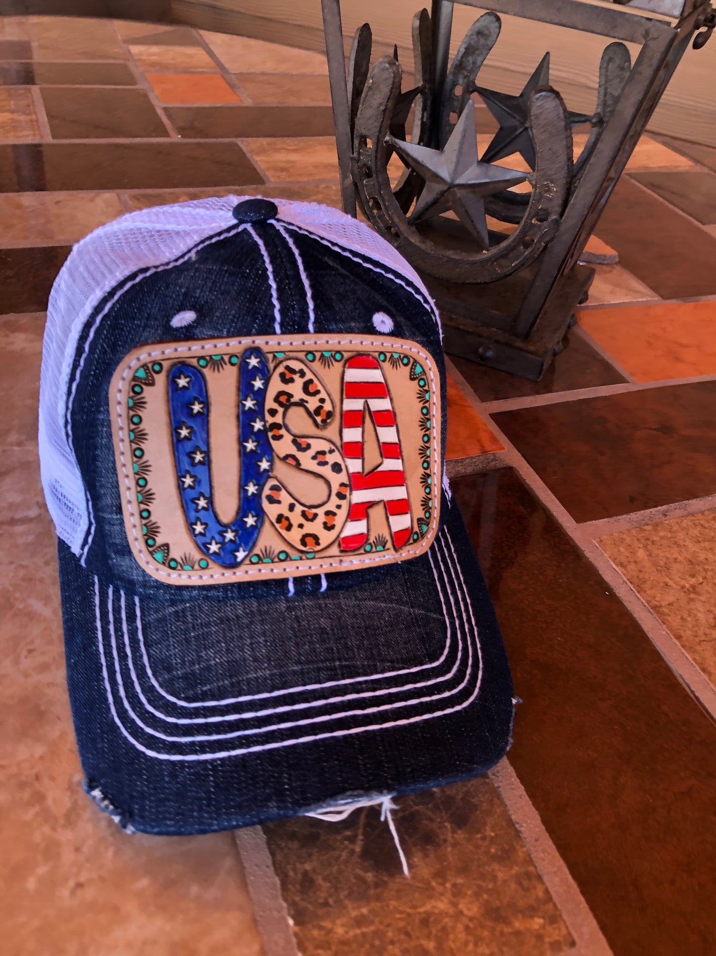 Women’s tooled leather patriotic USA patch denim trucker cap