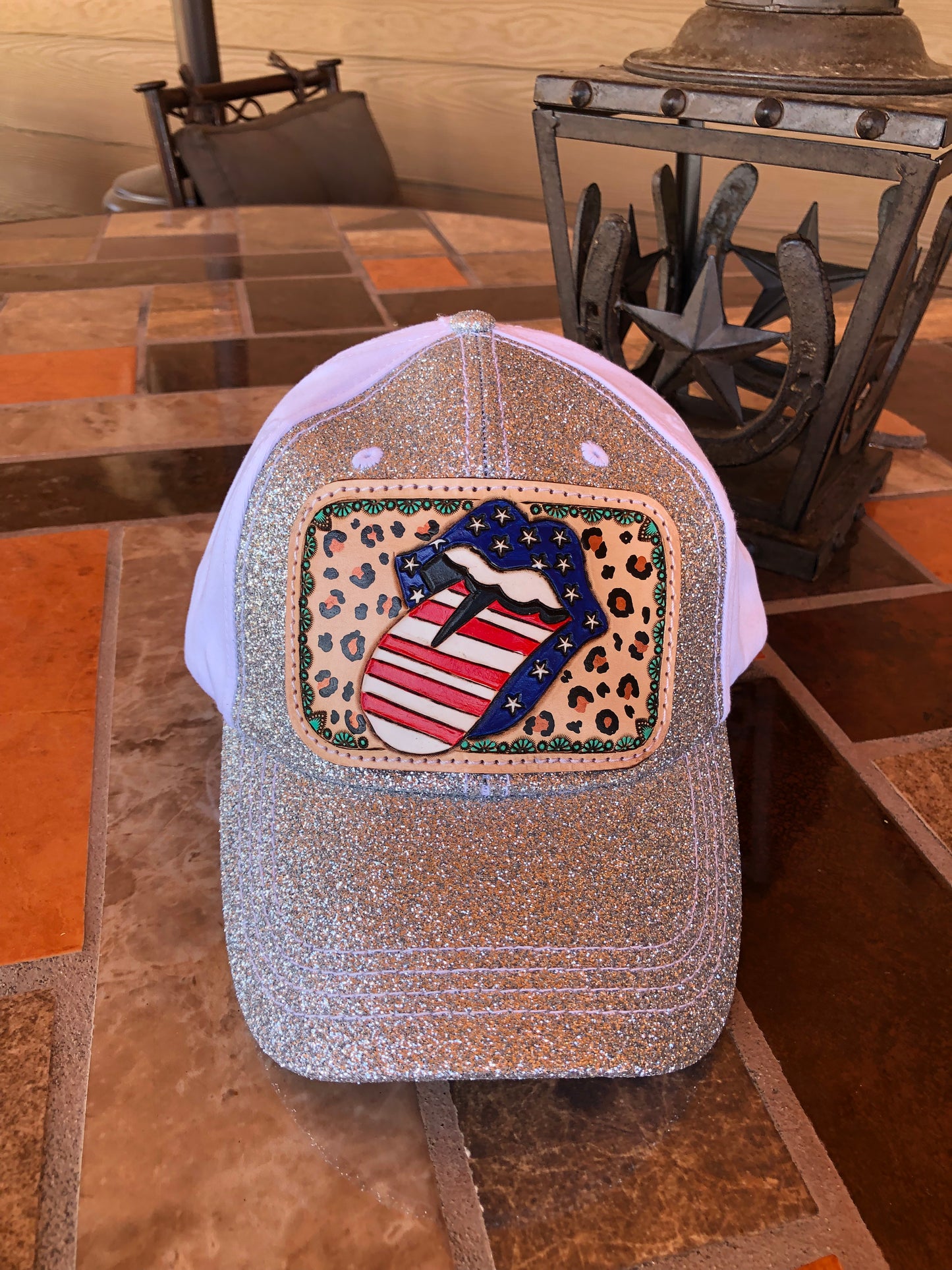 Women’s tooled leather patriotic rock n roll mouth patch silver glitter ponytail trucker cap