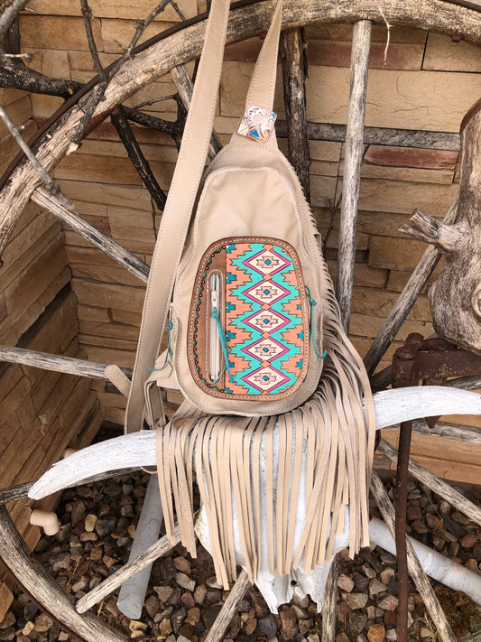 Southwestern geometric tooled leather fringe sling bag
