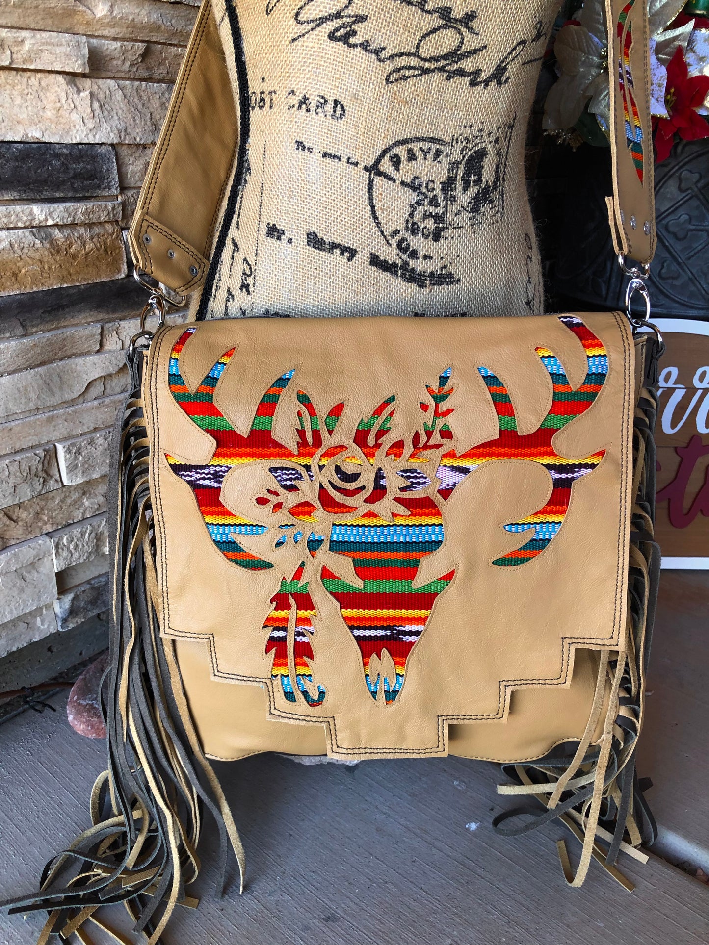 Western leather deer skull cutout with woven Guatemalan fabric fringe crossbody purse