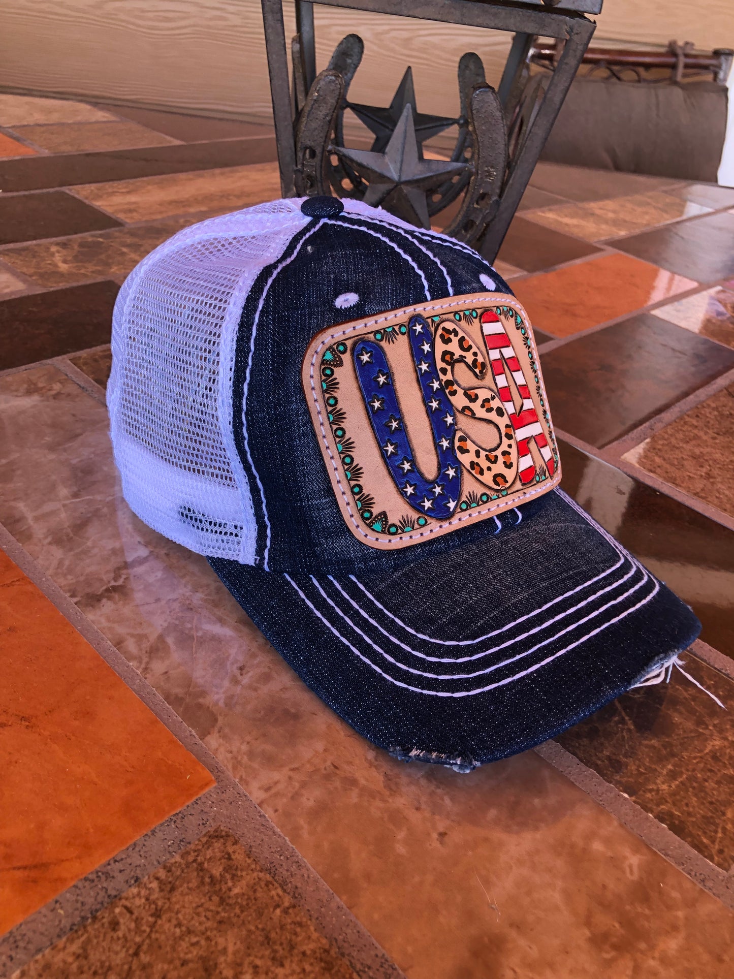 Women’s tooled leather patriotic USA patch denim trucker cap